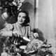 Joan Crawford carves a turkey for a 1930 publicity shot.